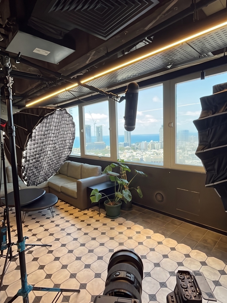Interview set built by Yuval, Tel Aviv skyline in the windows
