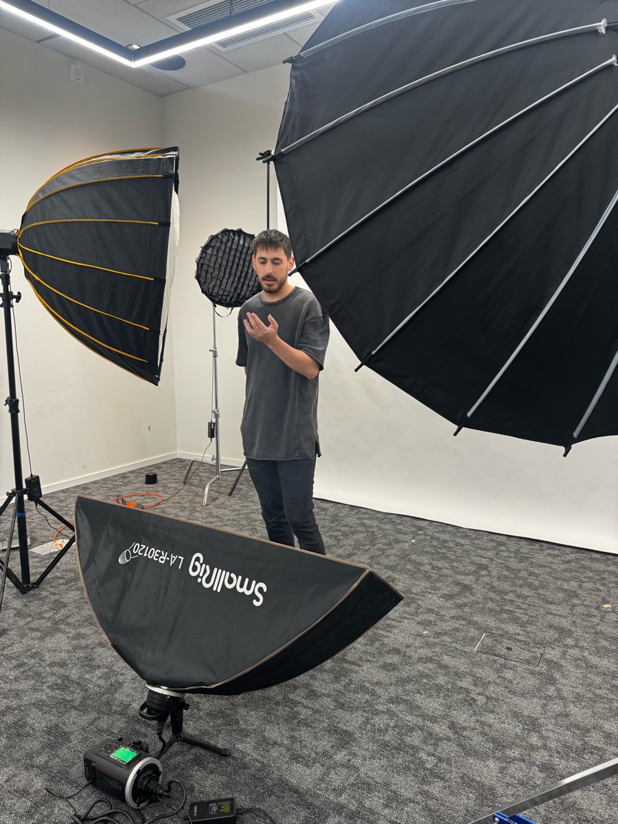 Yuval directing between studio lights